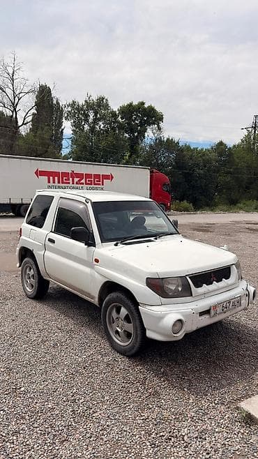 Транспорт: Mitsubishi Pajero iO: 1998 г., 1.8 л, Механика, Бензин, Внедорожник — 4