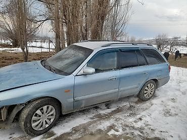 автомобили степ: Mazda 626: 2000 г., 2 л, Механика, Бензин, Универсал — 5