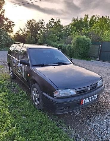 chery arrizo: Nissan Almera: 1988 г., 2 л, Механика, Бензин, Универсал — 1