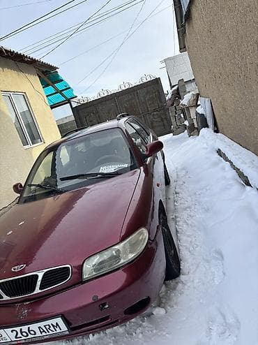 радиатор нубира: Daewoo Nubira: 1998 г., 2 л, Механика, Газ, Универсал — 7