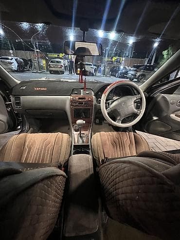 step 2: Nissan Cefiro: 1997 г., 2 л, Автомат, Газ, Седан — 5