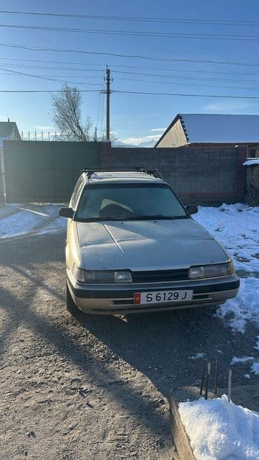 Mazda 626: 1995 г., Бензин