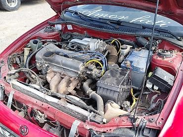 тканевый: Mazda Lantis: 1997 г., 1.5 л, Механика, Бензин, Хэтчбэк — 8