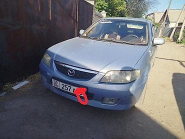 235 60 р18: Mazda 323: 2003 г., 1.6 л, Механика, Бензин, Универсал — 2