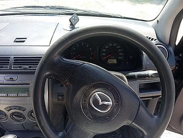 даихатсу сирион: Mazda Demio: 2005 г., 1.3 л, Автомат, Бензин, Хэтчбэк — 8