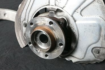 х5: Кулак поворотный левый (цапфа) на BMW x5 E70 Цена без подшибника — 2