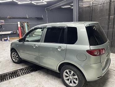Mazda Demio: 2004 г., 1.3 л, Автомат, Бензин, Хэтчбэк
