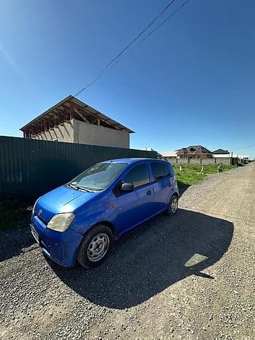 Унаа сатуу: Daihatsu Cuore: 2003 г., 1 л, Кол менен иштөөчү, Бензин, Хетчбек — 3