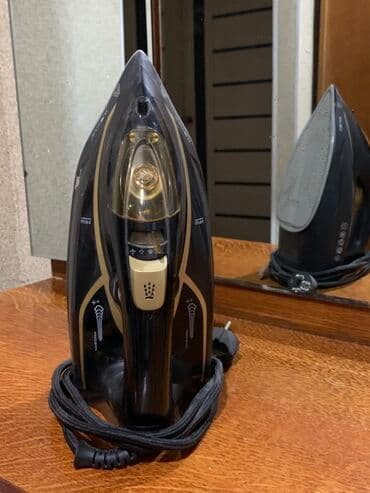 Утюг с паровым ударом HEGNER. Основные особенности: - Паровой утюг с