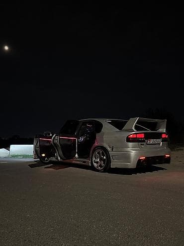 Транспорт: Subaru legacy b4. Тюнингованный спортивный седан (правый руль) Объем — 2