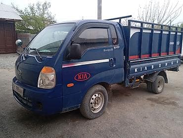 чемодан в багажник авто: Легкий грузовик, Kia, Стандарт — 1