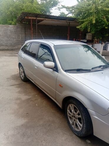 автомобиль бу: Mazda 323: 2003 г., 1.3 л, Механика, Бензин, Хетчбек — 2