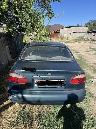 Унаа: Daewoo Lanos: 1997 г., 1.5 л, Кол менен иштөөчү, Бензин, Седан — 2
