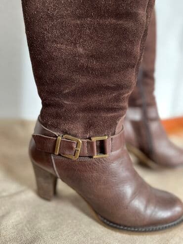 обувь для охоты: Пара коричневых сапог до колена. Изготовлены из натуральной кожи и — 4