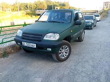 Транспорт: Chevrolet Niva: 2004 г., 1.7 л, Механика, Бензин, Внедорожник — 1