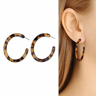 Серьги сөйкөлөркольца У с леопардовым принтом — стильный аксессуар