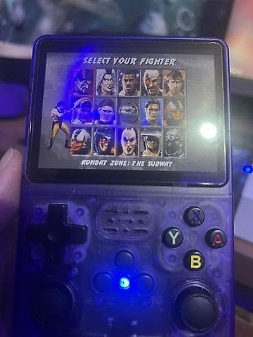 Консолдорду ижарага, киреге берүү: Портативная ретро‑консоль с прозрачным фиолетовым корпусом и — 1