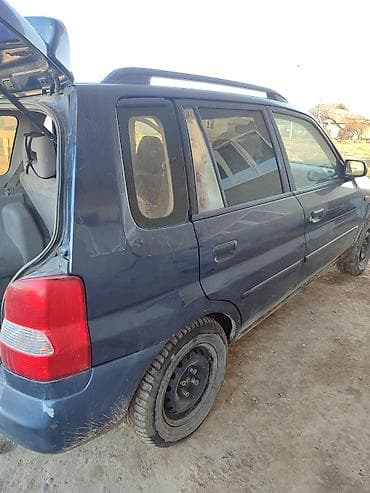 audi c7: Mazda Demio: 1997 г., Механика, Минивэн — 1