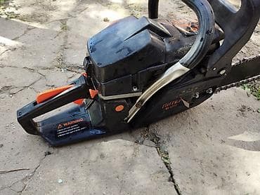 металлический пистолет: Бензопила «ПИТЕР» (маркировка на корпусе: П1‑5200) бенза пила почти — 4