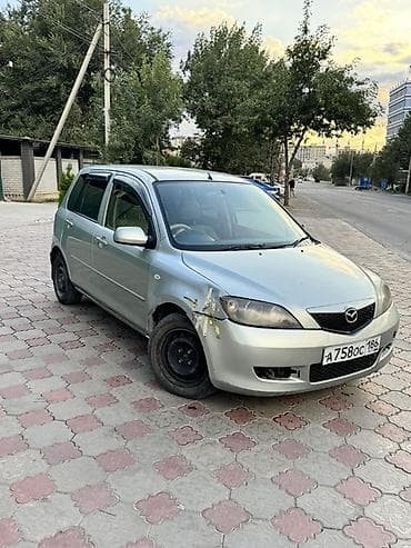 Mazda Demio: 2003 г., 1.3 л, Автомат, Газ, Хэтчбэк