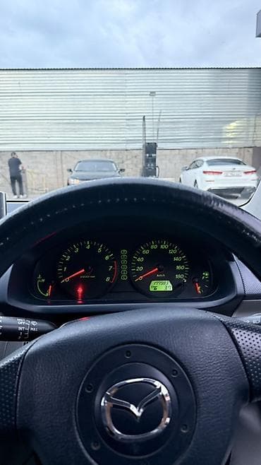 mazda 323 универсал: Mazda Demio: 2003 г., 1.3 л, Автомат, Бензин, Хэтчбэк — 9