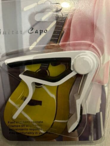 полуакустическая электрогитара: Каподастры, зажим для гитары — 1