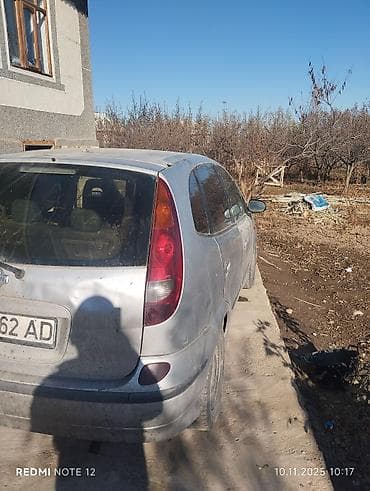 Nissan Tino: 2002 г., 2.2 л, Механика, Дизель, Хэтчбэк — 10