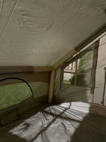 газовая балон: Двухдверная палатка с надувным каркасом и москитными сетками — 5