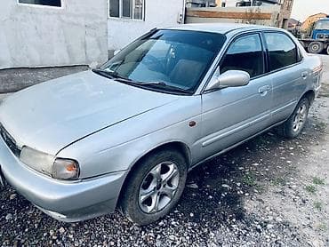 Седан серебристого цвета, компактного класса.Сузуки Култус at lalafo.kg Седан серебристого цвета, компактного класса.Сузуки Култус