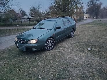 наклейки на авто: Nissan Primera: 1999 г., 2 л, Автомат, Газ, Универсал — 1