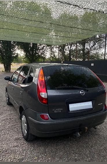 стояла: Nissan Almera Tino: 2004 г., Механика, Хэтчбэк — 2