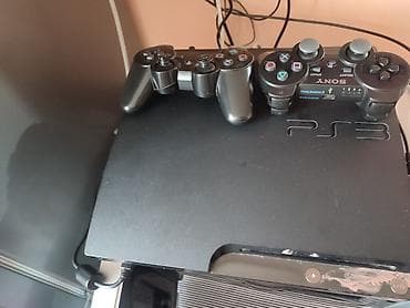 Sony PlayStation 3 (PS3) с двумя беспроводными геймпадами DualShock 3