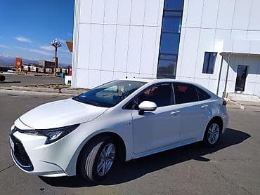 Toyota Corolla: 2019 г., 1.8 л, Автомат, Гибрид, Седан