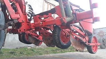 асфальт реска: Трактор колесный с кабиной + навесная сеялка Описание: - Колесная — 10