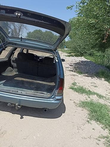 глушитель на опель зафира а: Nissan Primera: 1994 г., Механика — 4
