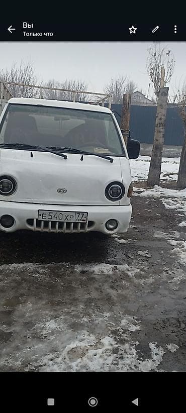 Унаа: Грузовой мини‑грузовик Hyundai Porter (кабовер), белый цвет, бортовая — 3