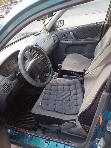 mazda 121: Mazda 323: 1999 г., 1.5 л, Ручные, Бензин, Хэтчбэк — 5