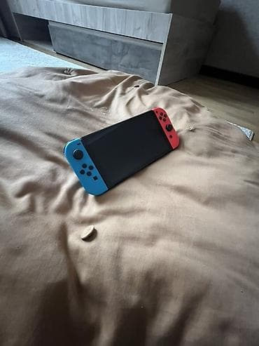 nintendo snes: Портативная игровая консоль Nintendo Switch с отсоединяемыми — 1