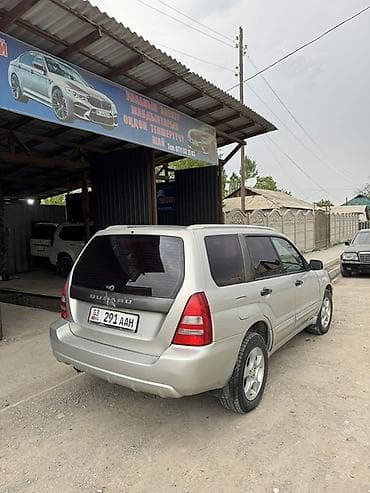 средний кузов: Subaru Forester: 2004 г., 2 л, Автомат, Бензин, Кроссовер — 6