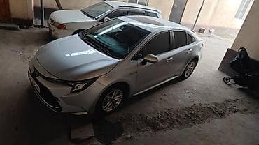 bmw x7 2020: Toyota Corolla: 2019 г., 1.8 л, Гибрид, Седан — 5