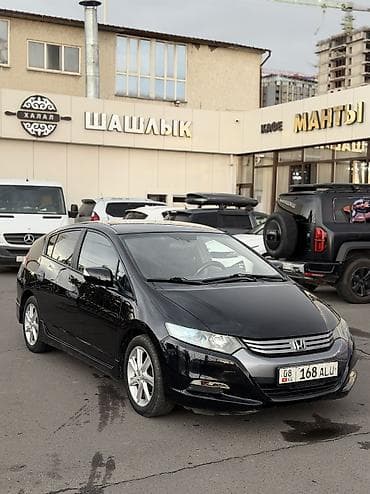 Honda Insight: 2010 г., 1.3 л, Вариатор, Гибрид, Фастбек — 1