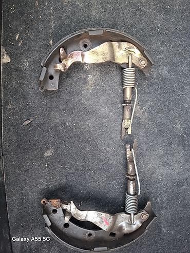 тормозной система: Комплект деталей стояночного тормоза (ручника) для задних барабанных — 1