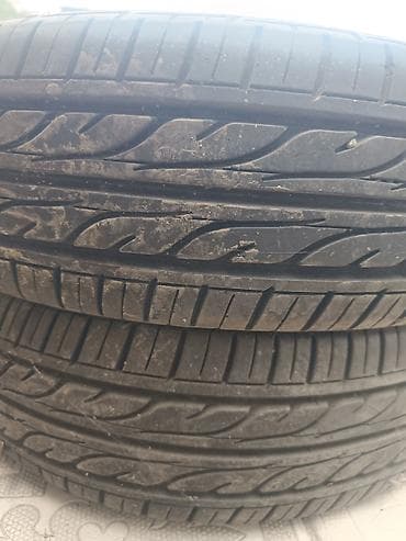 Унаа: Летние шины Dunlop Digi-Tyre - Размер: 175/65 R14 - Индекс — 1
