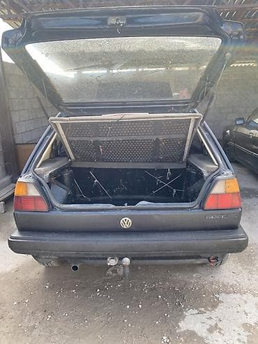 Унаа: Volkswagen Golf: 1990 г., 1.8 л, Кол менен иштөөчү, Бензин, Хетчбек — 7