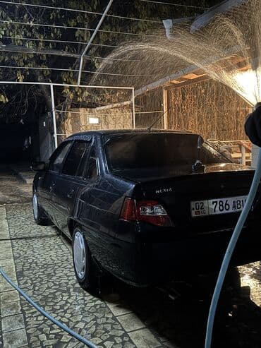 марк 2: Daewoo Nexia: 2012 г., 1.5 л, Механика, Бензин, Седан — 9