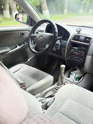 my kuzov: Mazda 626: 2002 г., Бензин, Седан — 7