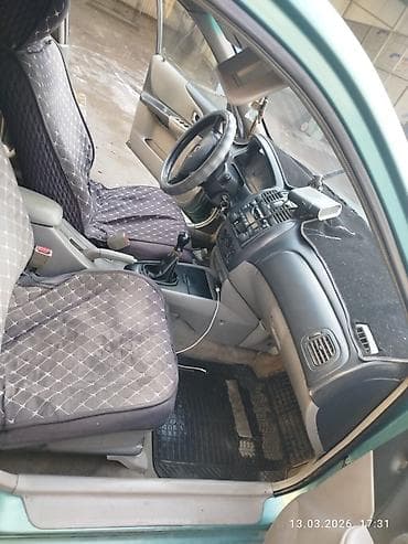 maz: Mazda 323: 2002 г., 1.6 л, Бензин, Универсал — 5