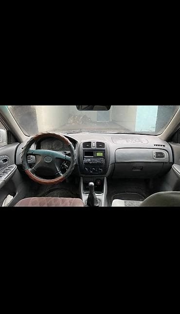 mazda 323 эфка: Mazda 323: 1998 г. — 5