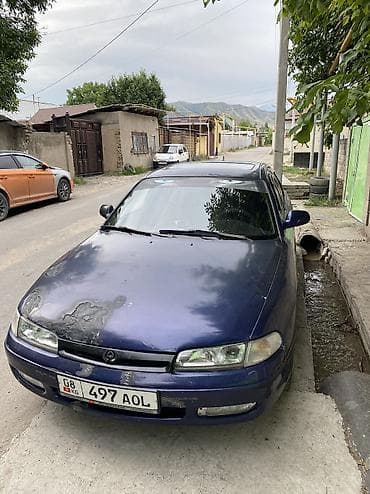 subaru sambar: Mazda 626: 1998 г., 2 л, Механика, Бензин, Хэтчбэк — 1