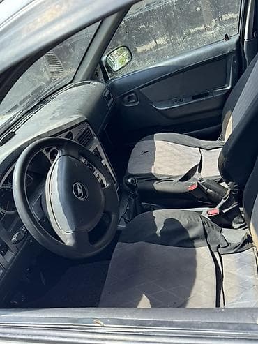 Унаа: Daewoo Nexia: 2012 г., 1.6 л, Кол менен иштөөчү, Бензин, Седан — 4